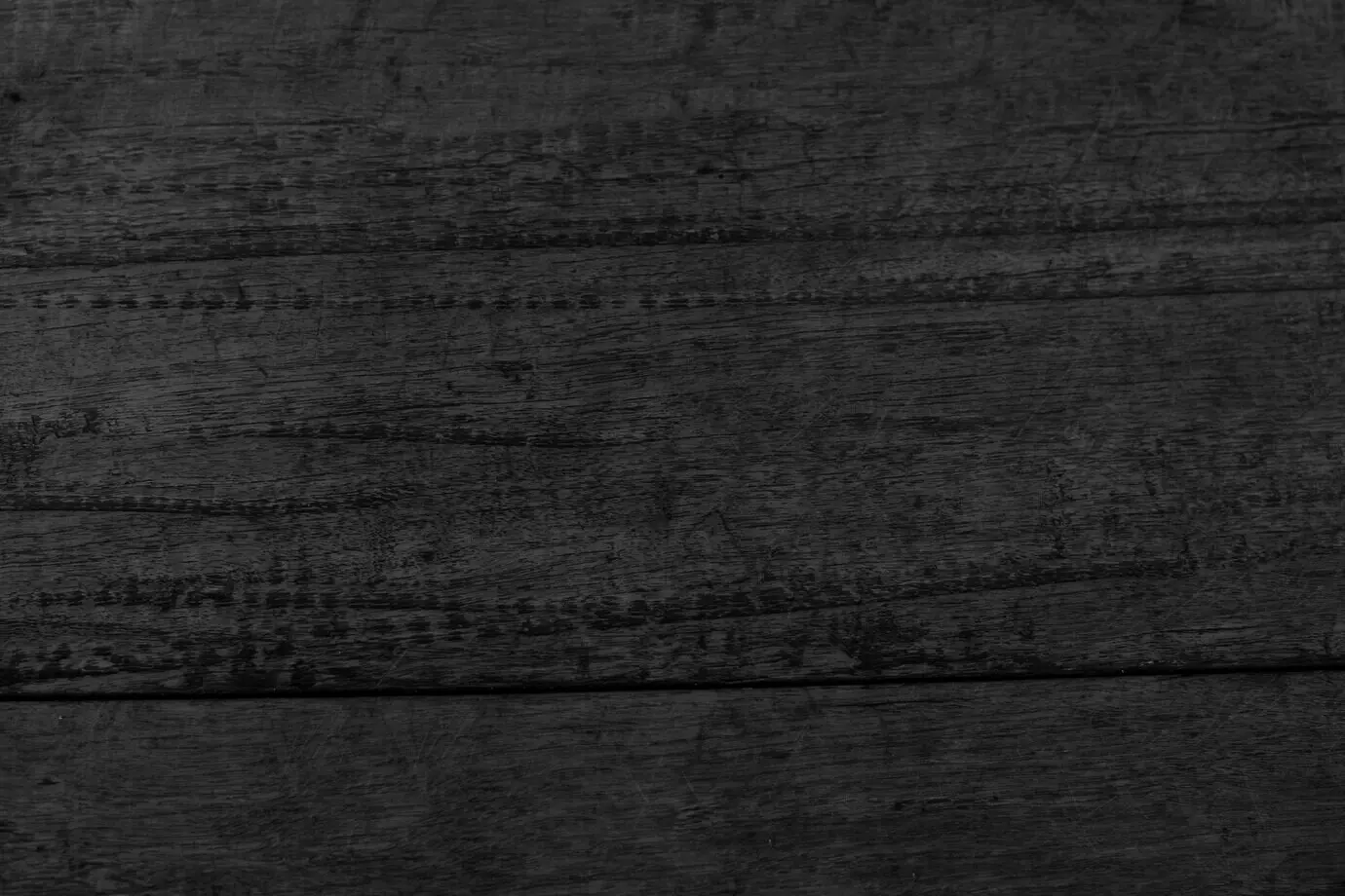 Hintergrund mit Textur schwarzer Holzplanken